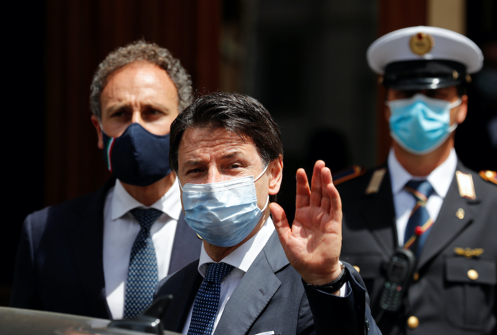 Italian Prime Minister Giuseppe Conte wearing a protective face mask, leaves the Senate as the spread of the coronavirus disease continues, in Rome, Italy May 20, 2020. u00e2u20acu201d Reuters picnnn