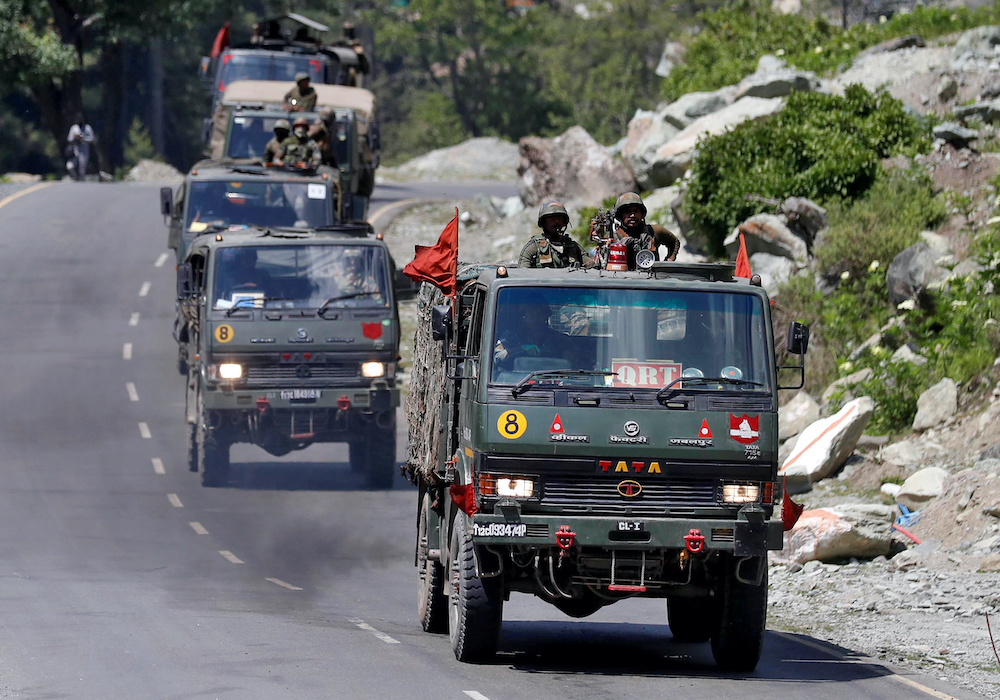An Indian Army convoy moves along a highway leading to Ladakh, at Gagangeer in Kashmiru00e2u20acu2122s Ganderbal district June 18, 2020. u00e2u20acu2022 Reuters picnnn