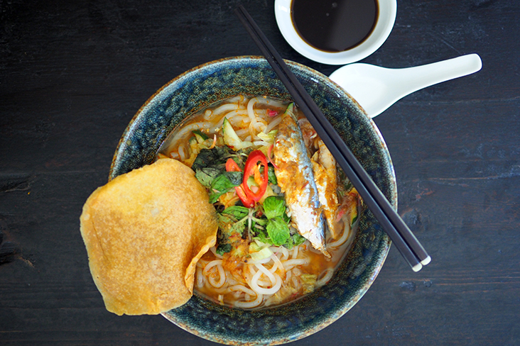 Their 'asam laksa' is tangy with a strained broth and is topped with poached fish, mint leaves, chillies, cucumber, onions, pineapples and a cracker