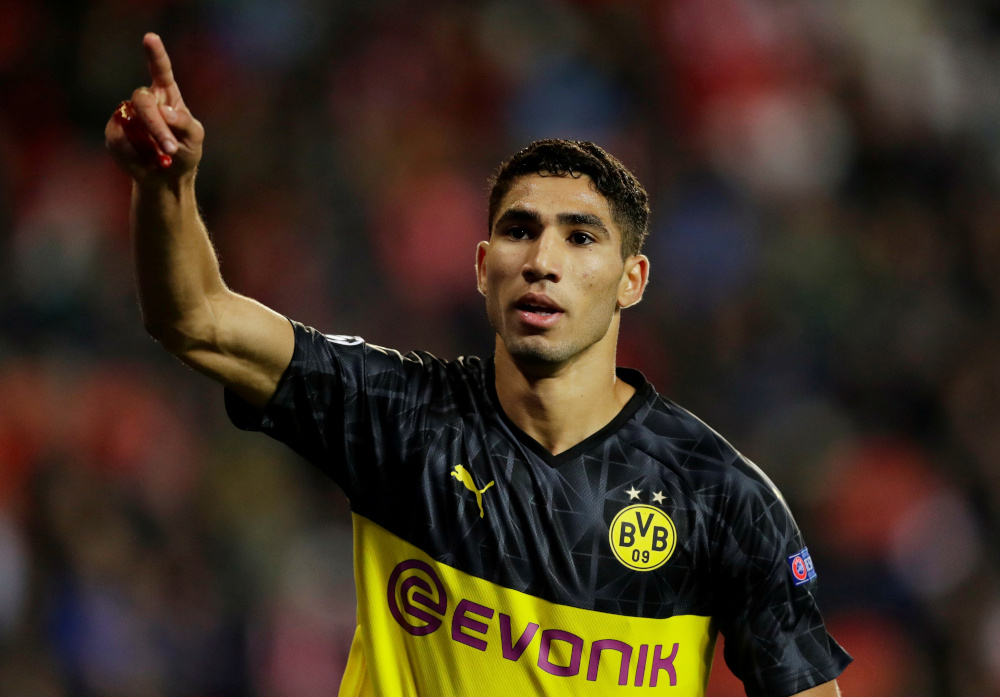 Borussia Dortmundu00e2u20acu2122s Achraf Hakimi celebrates scoring their second goal against SK Slavia Prague at the Eden Arena in Prague, October 2, 2019. u00e2u20acu201d Reuters pic 