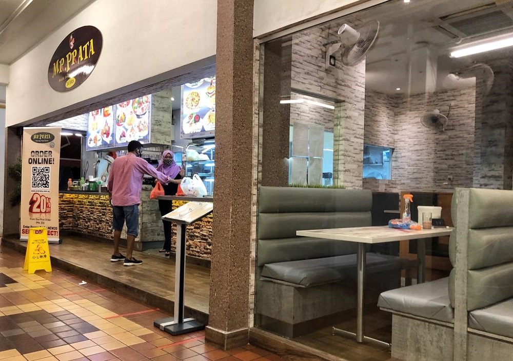 Mr Prata at Tampines Street 44 will open its sitting area at the stroke of midnight on June 19 to allow customers to dine in for the first time in over two months. u00e2u20acu2022 TODAY pic