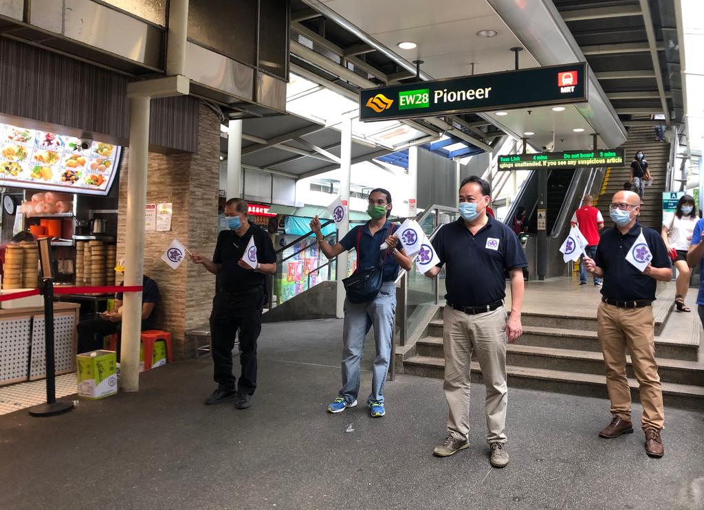 Peoples Voice Party members Prabu Ramachandran (second left), Lim Tean (third left) and Gilbert Goh (extreme right) on a walkabout at a coffee shop at Block 651 Jurong West Street 61, below Pioneer MRT Station, June 27, 2020. u00e2u20acu2022 TODAY pic