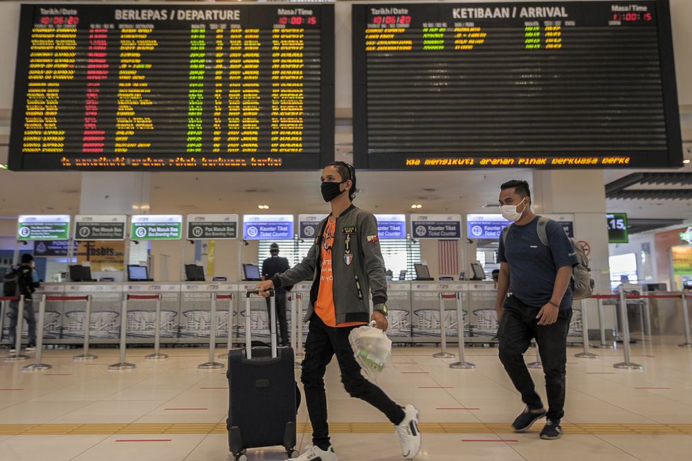 People wearing face masks are pictured at Terminal Bersepadu Selatan in Kuala Lumpur June 10, 2020. u00e2u20acu201d Picture by Shafwan Zaidon