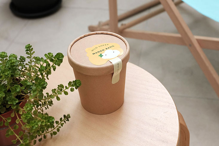 A tub of refreshing Mango Basil ice cream ready for delivery or takeaway