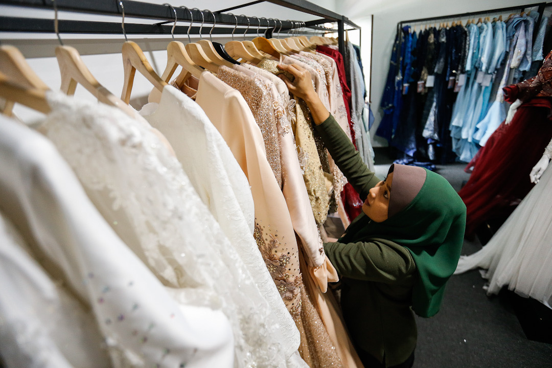 A worker is pictured at the Kaled Ross Weddings and Events bridal boutiquein Balik Pulau on June 29, 2020 as it prepares to welcome back customer on July 1. u00e2u20acu201d Picture by Sayuti Zainudinnn