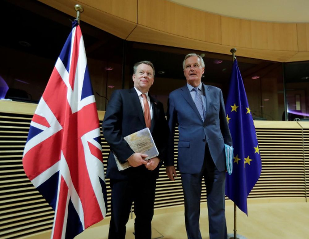 European Union chief Brexit negotiator Michel Barnier and British Prime Ministeru00e2u20acu2122s Europe adviser David Frost 5 are seen at start of the first round of post -Brexit trade deal talks between the EU and the United Kingdom, in Brussels, Belgium March 2, 20