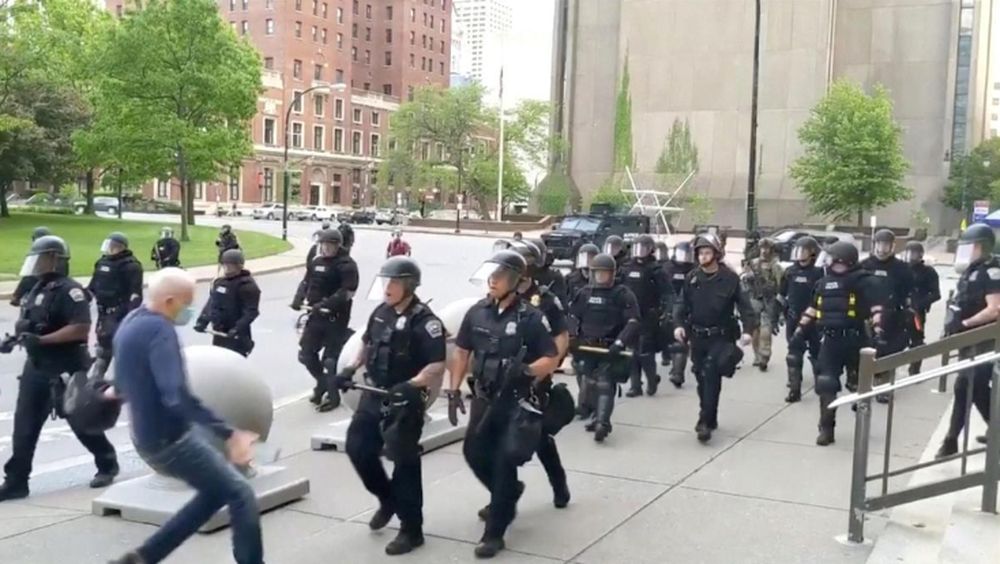 An elderly man falls after appearing to be shoved by riot police during a protest against the death in Minneapolis police custody of George Floyd, in Buffalo, New York, US, June 4, 2020 in this still image taken from video. u00e2u20acu201d WBFO/via Reuters
