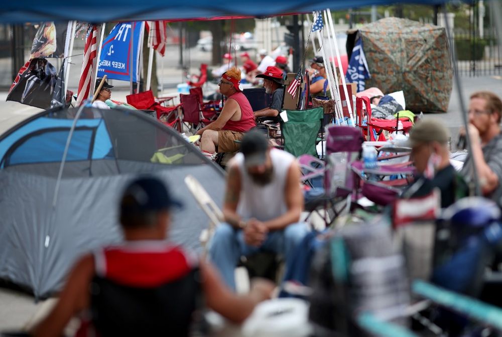 Supporters of US President Donald Trump line up to attend the Trumpu00e2u20acu2122s campaign rally near the BOK Center, site of tomorrowu00e2u20acu2122s rally, June 19, 2020 in Tulsa, Oklahoma. u00e2u20acu201d Getty Images via AFP