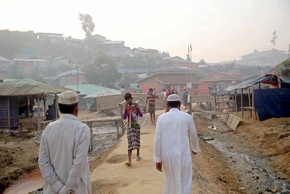 Rohingya refugees walk on a road at the Balukhali camp in Cox's Bazar, Bangladesh April 8, 2019. u00e2u20acu201d Reuters pic