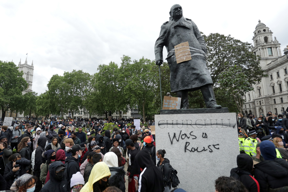 The statue of former British prime minister Winston Churchill is seen defaced in Parliament Square, central London after a demonstration outside the US Embassy, June 7, 2020, organised to show solidarity with the Black Lives Matter movement. u00e2u20acu201d AFP pic 