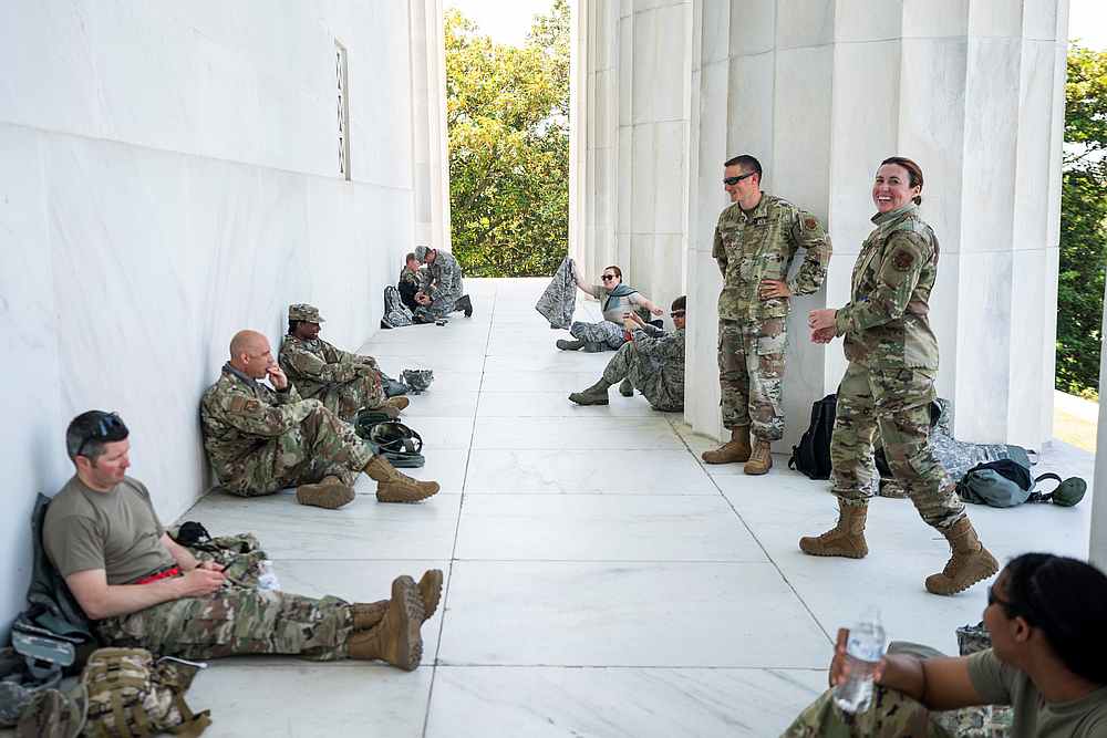 Members of the DC National Guard take a short rest from standing guard at the Lincoln Memorial, in Washington June 4, 2020. u00e2u20acu201d Jim Lo Scalzo/Pool pic via Reuters