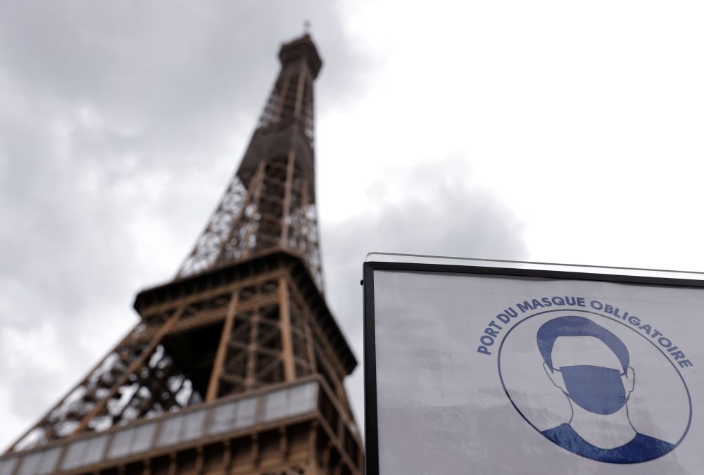 A sign that reads u00e2u20acu02dcMandatory to wear a mask on all the siteu00e2u20acu2122 is seen at the entrance of the Eiffel Tower in Paris June 17, 2020. u00e2u20acu201d Reuters pic