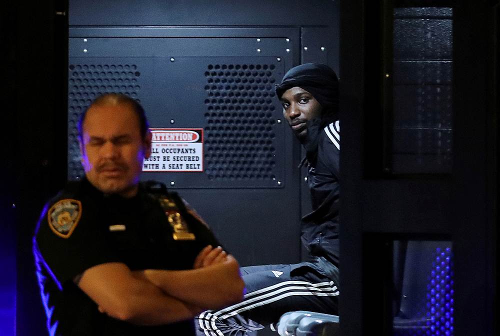 A detained demonstrator is seen inside a vehicle during a protest against the death in Minneapolis police custody of George Floyd, in New York June 2, 2020. u00e2u20acu201d Reuters pic