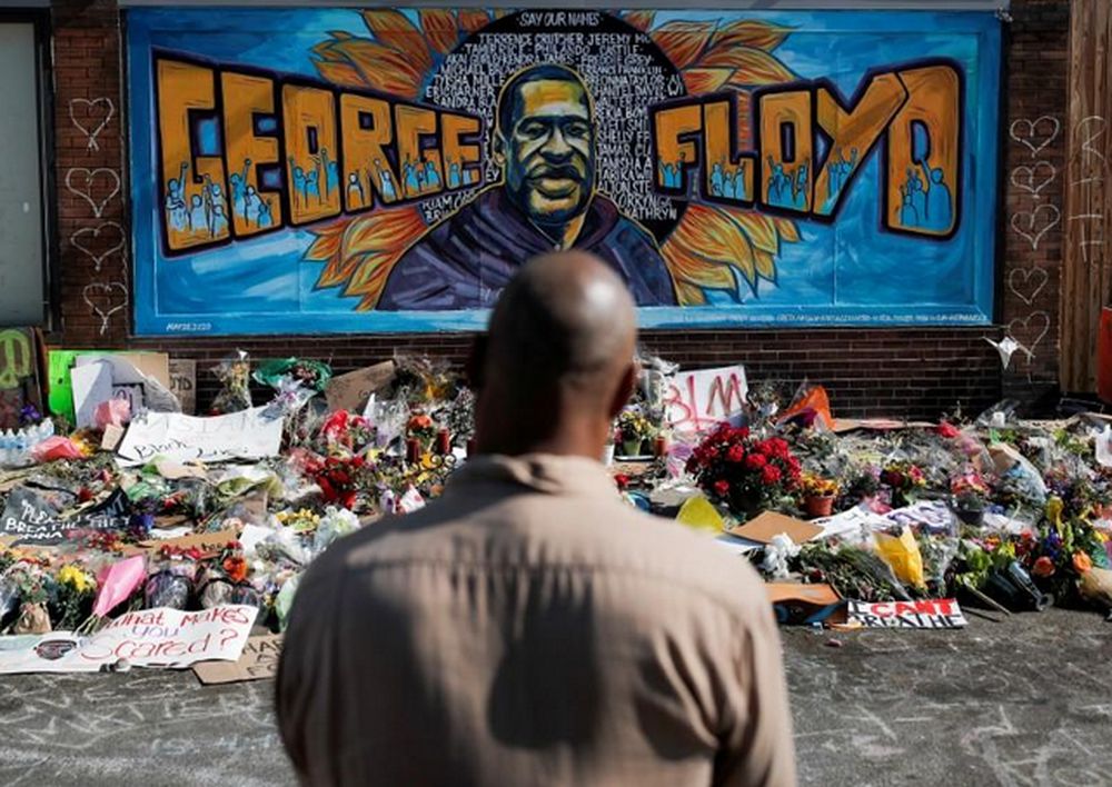 A local resident stands in front of a makeshift memorial honouring George Floyd, at the spot where he was taken into custody, in Minneapolis, Minnesota, US, June 1, 2020. u00e2u20acu201d Reuters pic