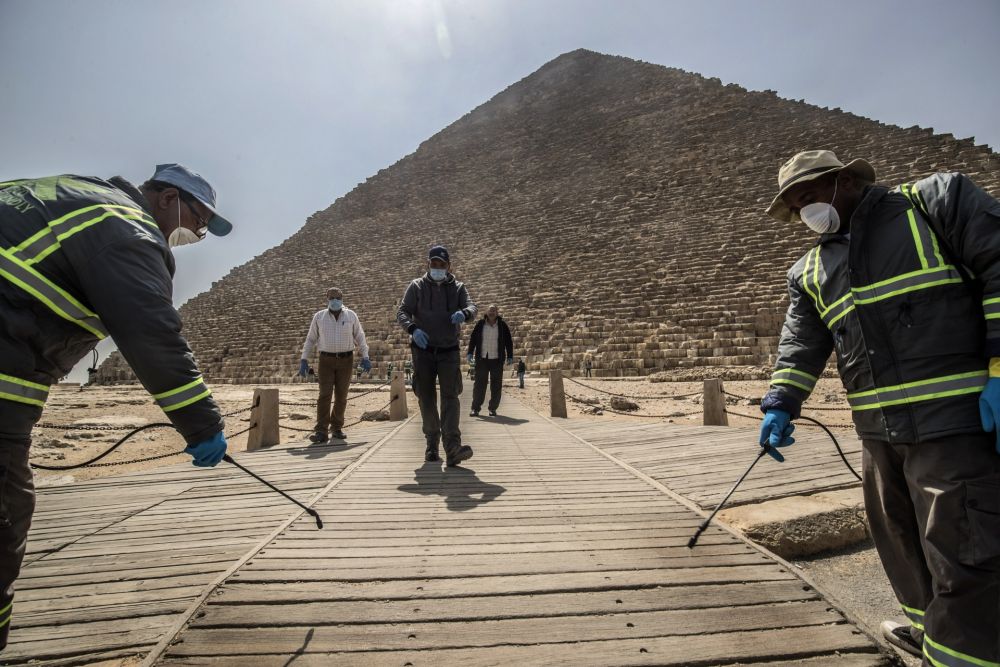 Egyptian municipality workers disinfect the Giza pyramids necropolis on the southwestern outskirts of the Egyptian capital Cairo, as protective a measure against the spread of the coronavirus. u00e2u20acu201d AFP pic