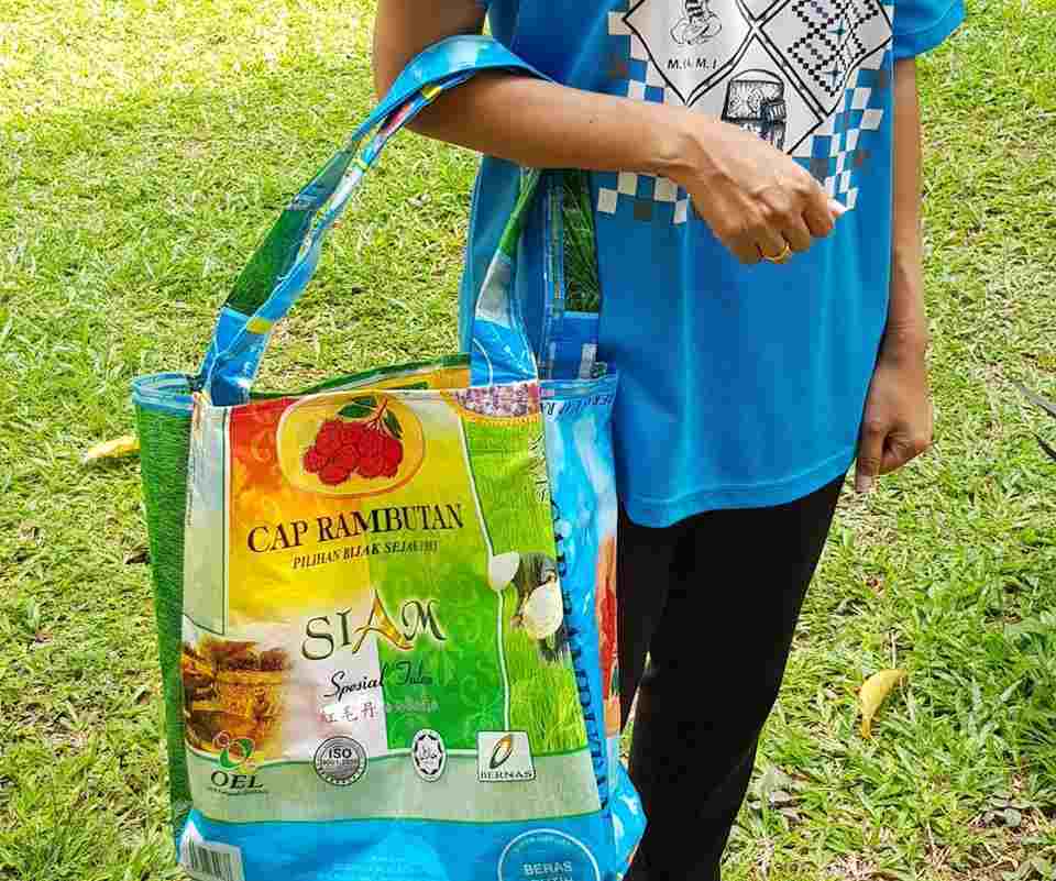 Instead of sending empty rice bags to the landfill, why not recycle them to become a grocery bags made by Orang Asli women at Labu, Negeri Sembilan. u00e2u20acu201d Picture courtesy of Carrol Lawrence