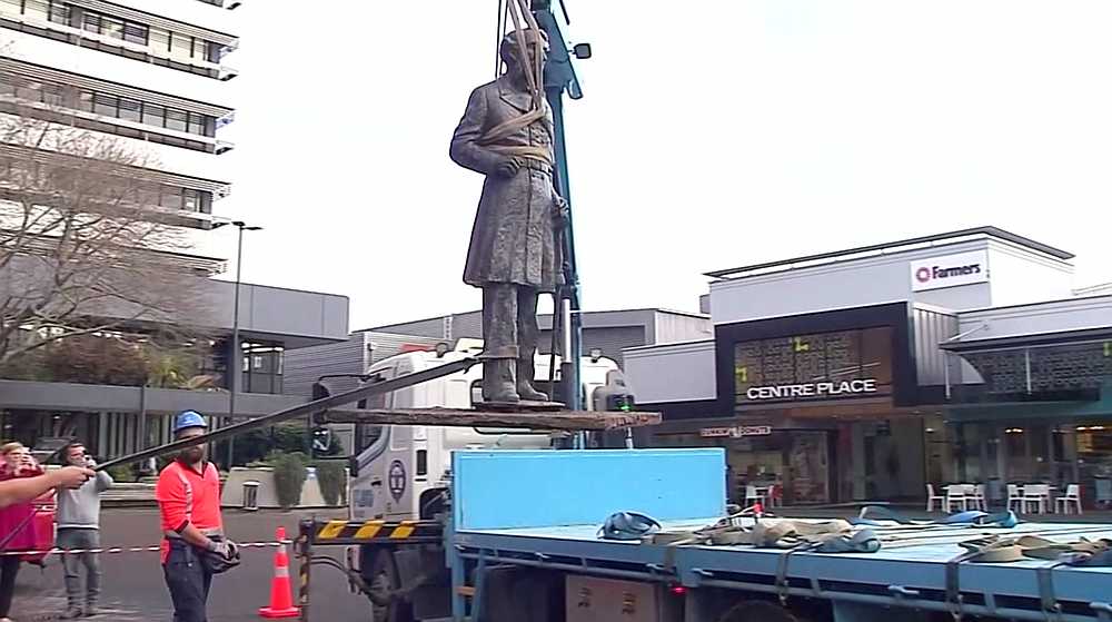 Statue of British Naval Captain John Fane Charles Hamilton is lifted out of the ground and onto a truck in Hamilton, New Zealand June 12, 2020. u00e2u20acu201d TVNZ image via Reuters
