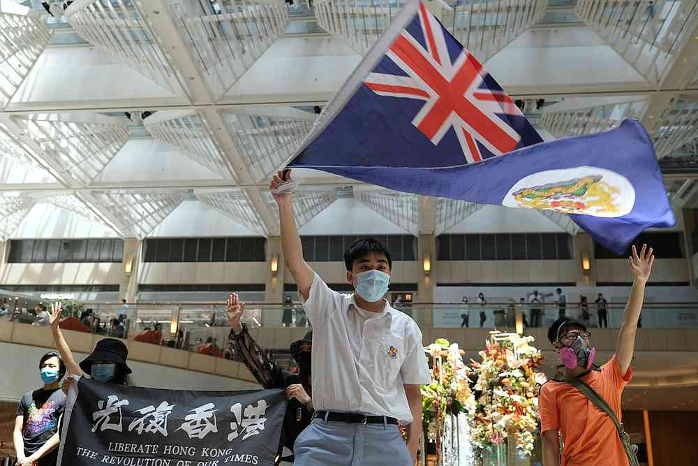 A pro-democracy demonstrator waves the British colonial Hong Kong flag during a protest against new national security legislation in Hong Kong, China June 1, 2020. u00e2u20acu201d Reuters pic