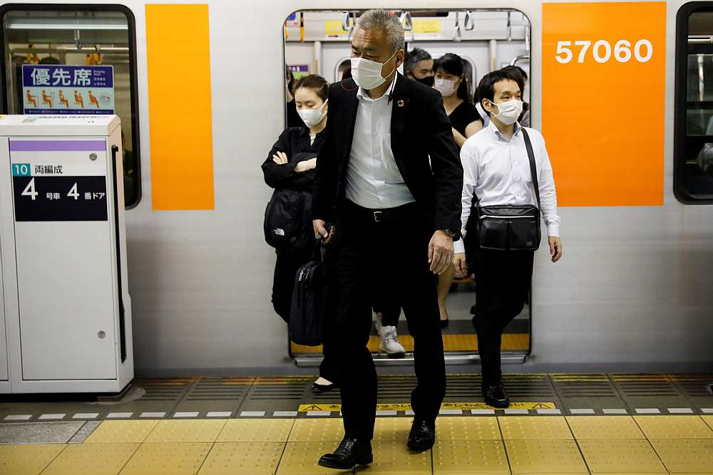 Passengers wearing protective masks get off a subway train at Shibuya station amid the Covid-19 outbreak in Tokyo, Japan May 27, 2020. u00e2u20acu201d Reuters pic