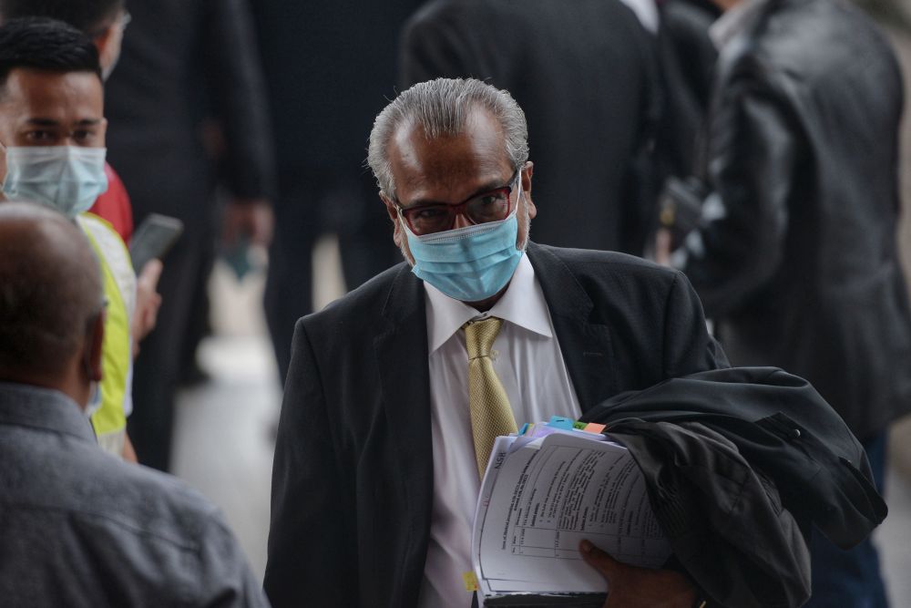 Lawyer Tan Sri Muhammad Shafee Abdullah arrives at the Kuala Lumpur High Court June 16, 2020. u00e2u20acu201d Picture by Shafwan Zaidon