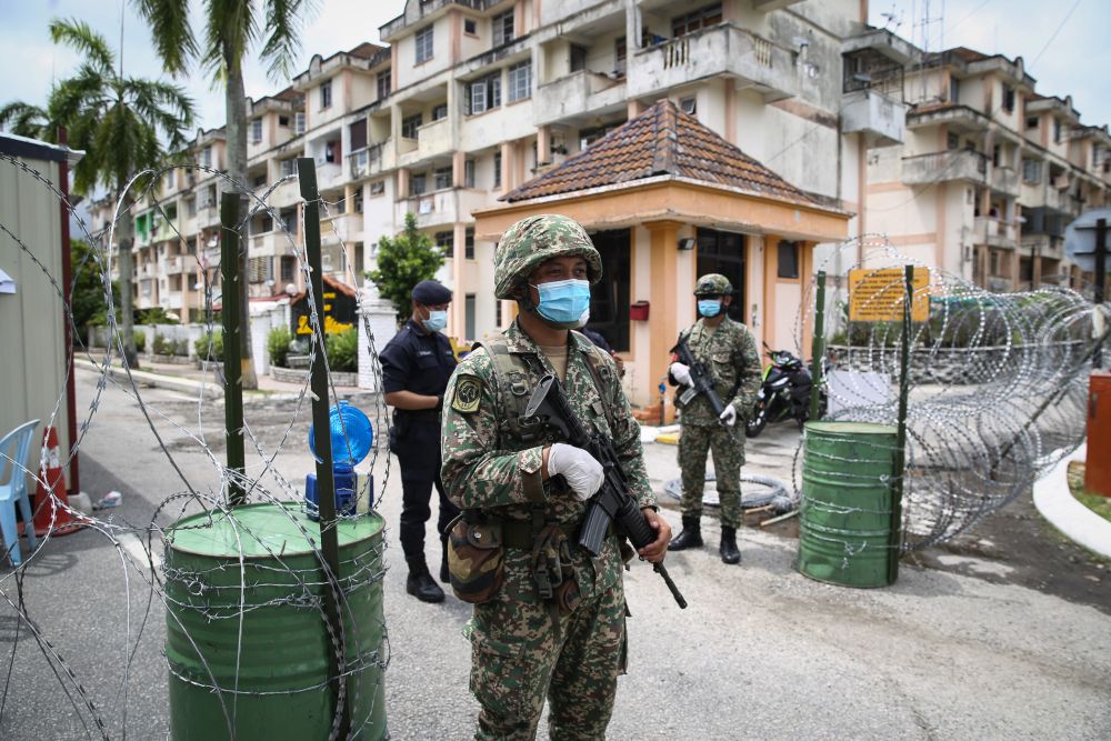 Armed Forces and police personnel man a roadblock in Taman Langat Murni, Kuala Langat June 4, 2020. u00e2u20acu201d Picture by Yusof Mat Isannn