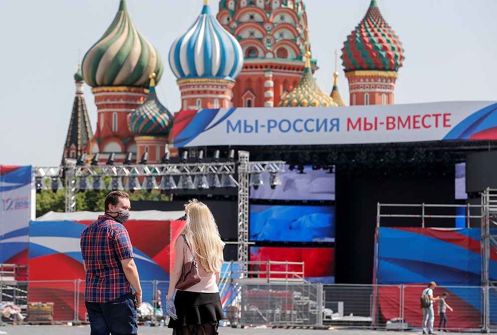 A couple approach a stage installed ahead of Russia Day celebrations, amid the Covid-19 outbreak, in Red Square, Moscow, Russia June 11, 2020. u00e2u20acu201d Reuters pic
