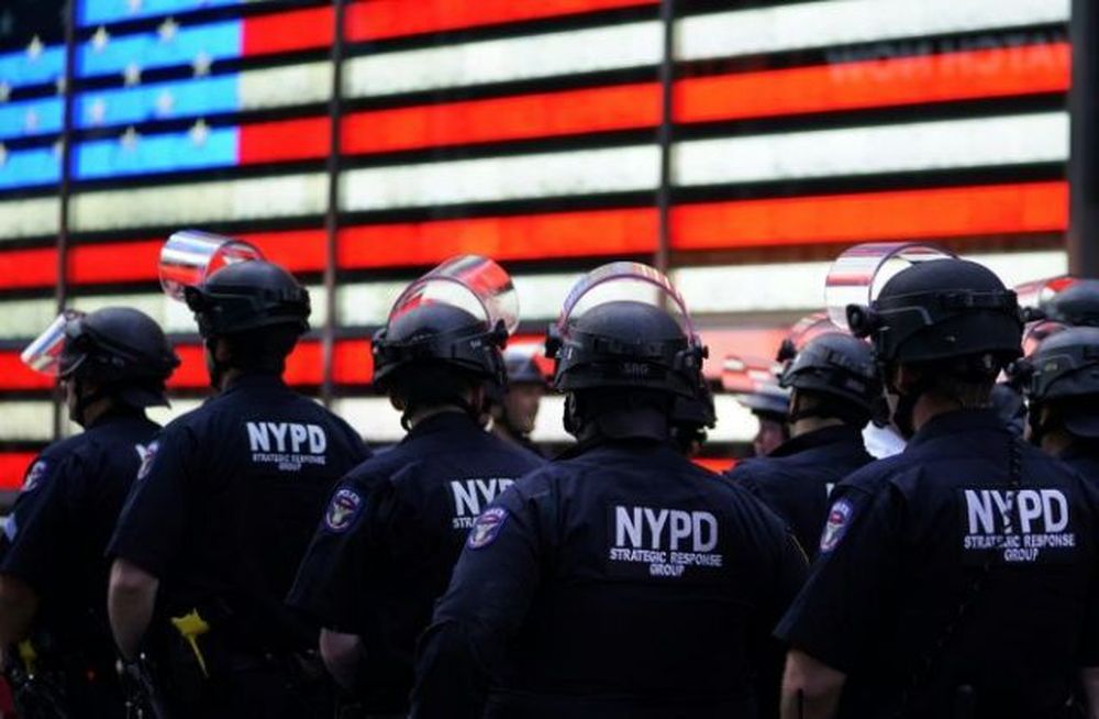 NYPD police officers watch demonstrators in Times Square on June 1, 2020, during a u00e2u20acu02dcBlack Lives Matteru00e2u20acu2122 protest. u00e2u20acu201d AFP pic