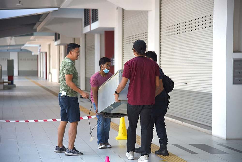 10 Sen refrigerator being delivered to its new owner. — Picture courtesy of Facebook/ Kuan Chee Heng