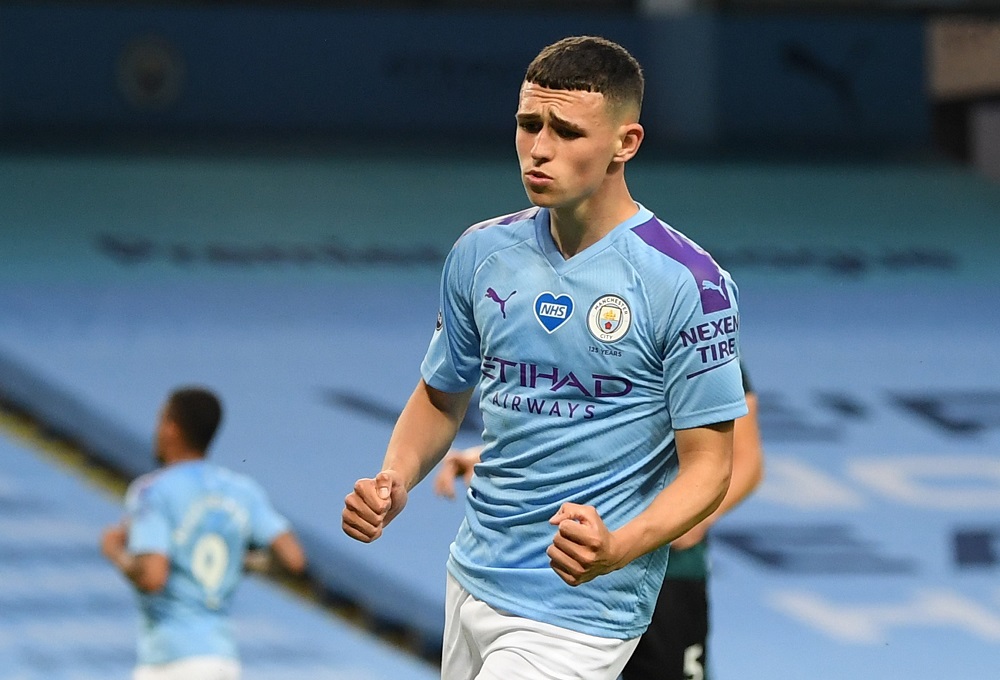 Manchester City's Phil Foden celebrates after scoring the fifth goal against Burnley June 23, 2020. u00e2u20acu2022 Reuters pic