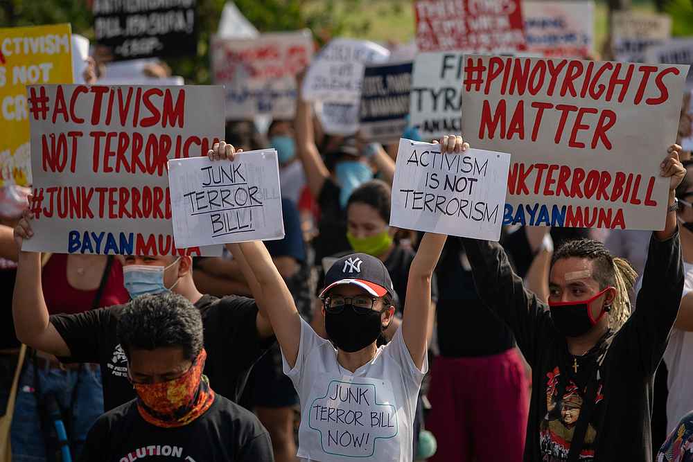 Protestors raise placards calling to scrap the proposed anti-terror bill out of fear it could be used to suppress and harass those who challenge President Rodrigo Duterte, Manila, Philippines, June 4, 2020. u00e2u20acu201d Reuters pic