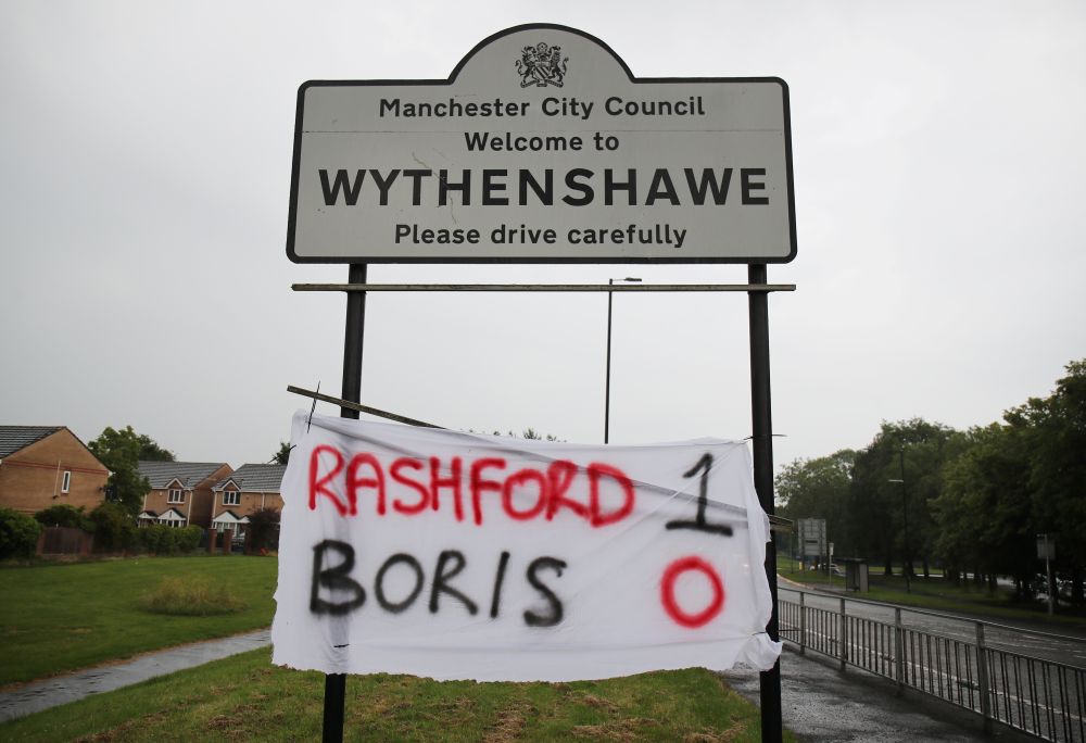 A banner is seen in Wythenshawe after Britain's Prime Minister Boris Johnson and government in England agreed to extend free school meals during the summer holidays for struggling families in England June 16, 2020. u00e2u20acu201d Reuters pic