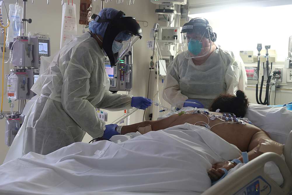 Medical staff attend to a patient suffering from the Covid-19 in the Intensive Care Unit (ICU), at Scripps Mercy Hospital in Chula Vista, California May 12, 2020. u00e2u20acu201d Reuters pic