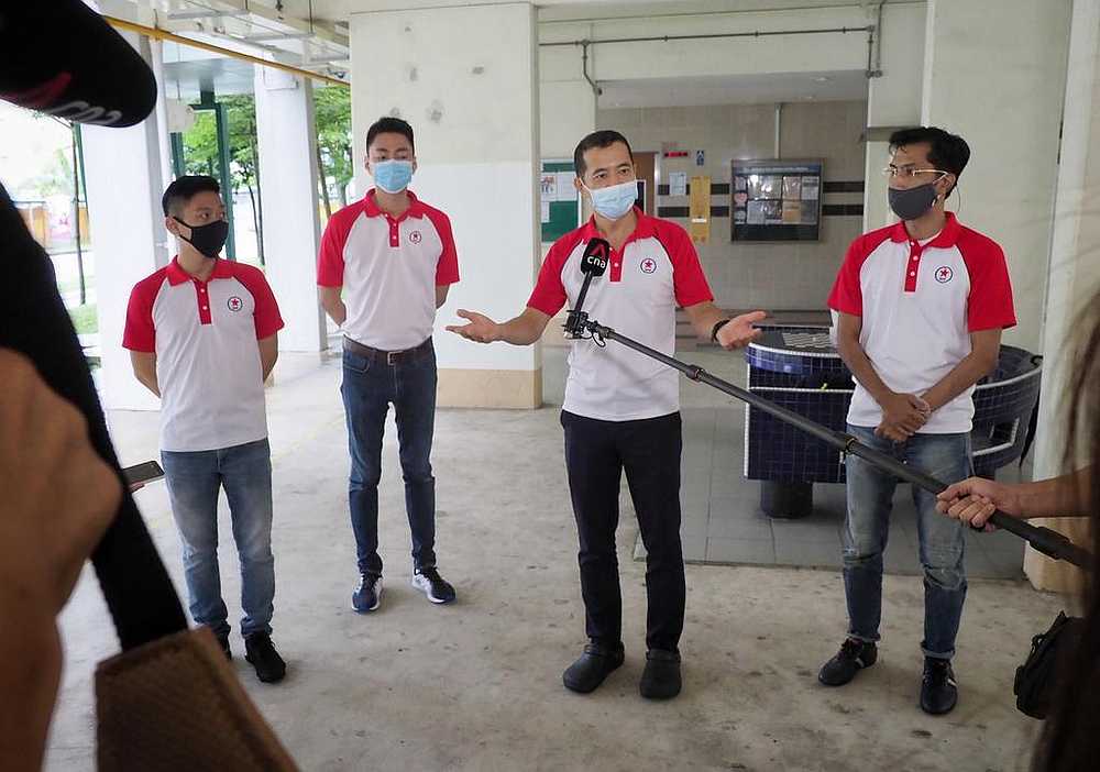 (From left) Williiamson Lee, Melvyn Chiu, Steve Chia and Osman Sulaiman speaking to the media at the void deck of Block 131 Bishan Street 12, Singapore June 20, 2020. u00e2u20acu201d TODAY pic