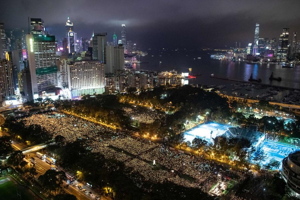 This file photo taken on June 4, 2019 shows people attending a candlelight vigil at Victoria Park in Hong Kong, to mark the 30th anniversary of the 1989 Tiananmen crackdown in Beijing. u00e2u20acu201d AFP pic