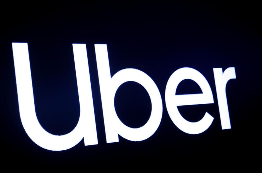A screen displays the company logo for Uber Technologies Inc on the day of its IPO at the New York Stock Exchange (NYSE) in New York, US, May 10, 2019. u00e2u20acu201d Reuters pic