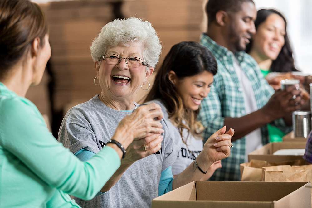New research has highlighted some of the health benefits that volunteering can bring to older adults. u00e2u20acu201d istock.com/Steve Debenport pic via AFP