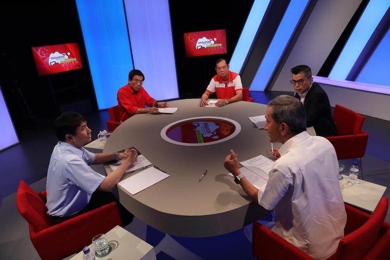 Clockwise from right: Vivian Balakrishnan, Jamus Lim, Chee Soon Juan, Francis Yuen and moderator Jaime Ho from Mediacorp in a live televised political debate, July 1, 2020. u00e2u20acu201d Screenshot from Mediacorp TV