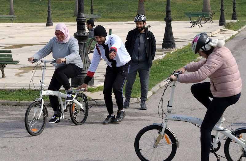 Tunisian women learn to cycle at the Japanese garden in central Tunis which is every Sunday transformed into an impromptu bicycle academy for dozens of novice cyclists. u00e2u20acu201d AFP pic