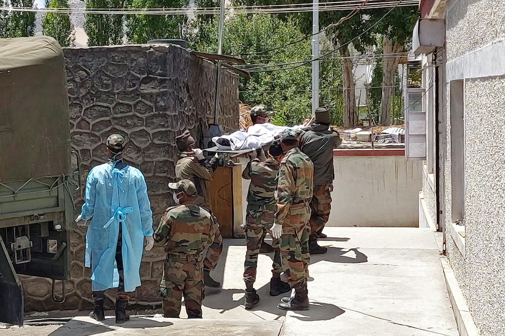 Indian army soldiers carry the body of their colleague, who was killed in a border clash with Chinese troops, to an autopsy centre at the Sonam Norboo Memorial Hospital in Leh, June 17, 2020. u00e2u20acu201d Reuters pic