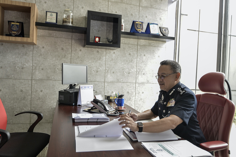 Commercial Crime Investigation Department (CCID) acting director Commissioner Datuk Saiful Azly Kamaruddin is seen in his office during an interview with Malay Mail. — Picture by Shafwan Zaidon