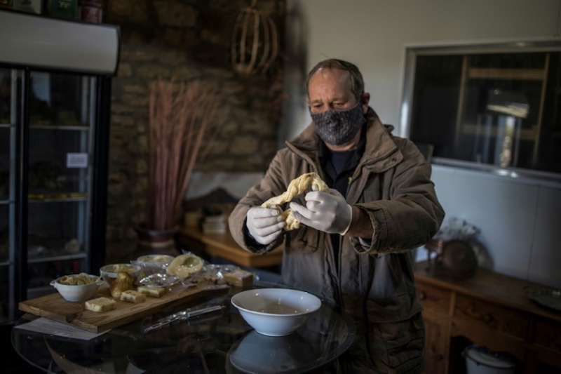 Cheesemakers Danie Crowther and his wife Marietjie Crowther only managed to produce small amounts of their signature smoked mozzarella and chilli-infused u00e2u20acu02dcstring cheeseu00e2u20acu2122 during the virus lockdown. u00e2u20acu201d AFP pic
