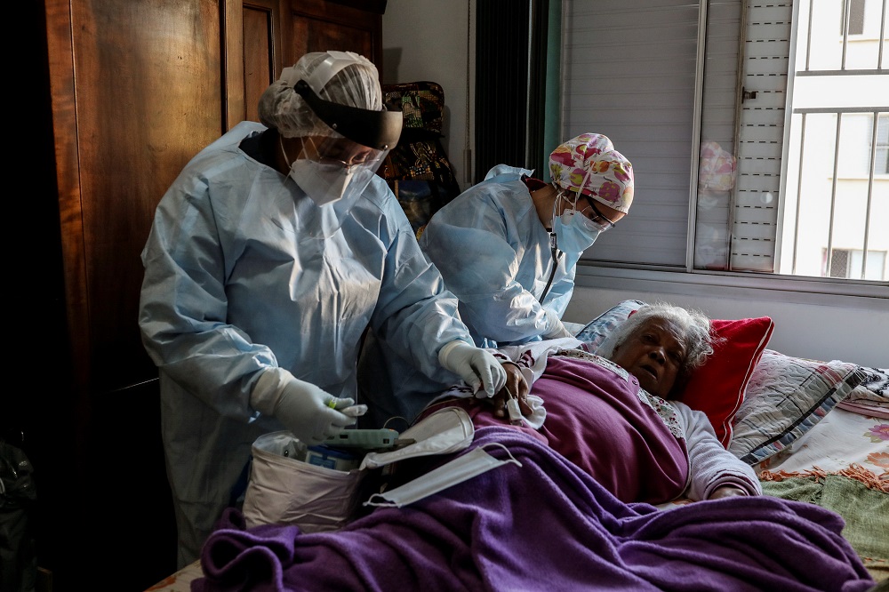 Emergency Rescue Service nurses attend to a patient who is experiencing breathing difficulty and others symptoms of the coronavirus disease (Covid-19) amid the outbreak, in Sao Paulo July 2, 2020. u00e2u20acu201d Reuters pic