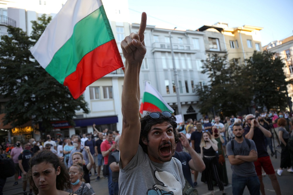 A man shout slogans during a demonstration in front of the Court of Justice after prosecutors raided the Bulgarian presidentu00e2u20acu2122s offices as part of investigations, in Sofia,  Bulgaria July 9, 2020. u00e2u20acu201d Reuters pic