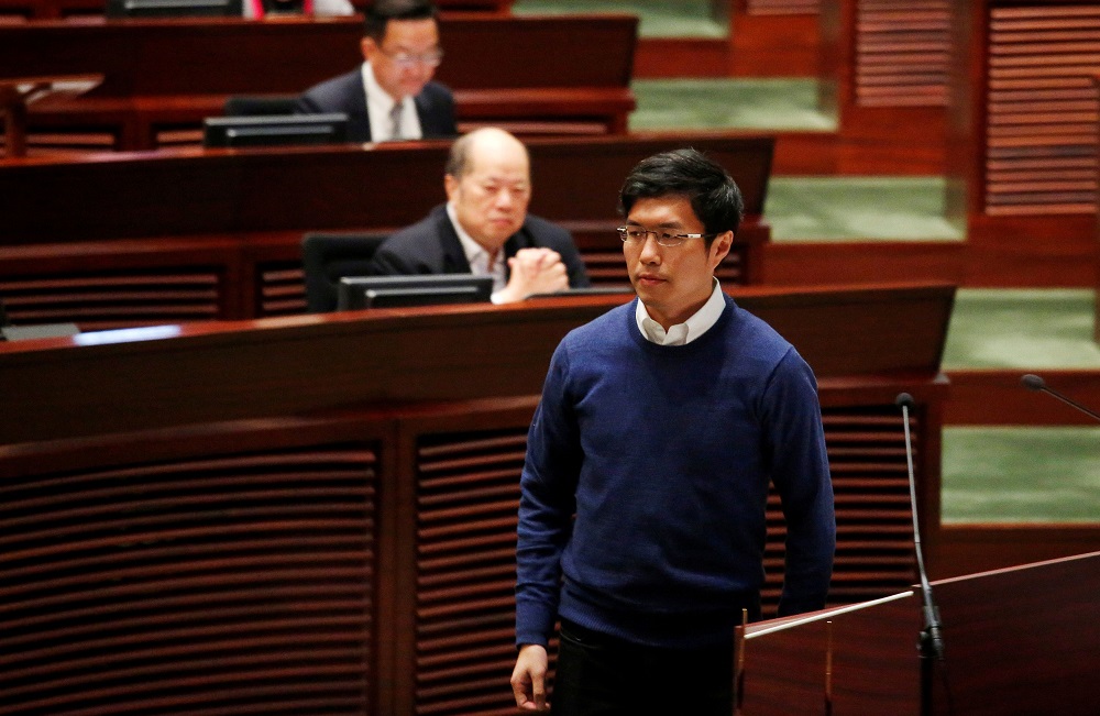 Newly-elected lawmaker Au Nok-hin walks after swearing in at the Legislative Council in Hong Kong March 21, 2018. u00e2u20acu201d Reuters pic