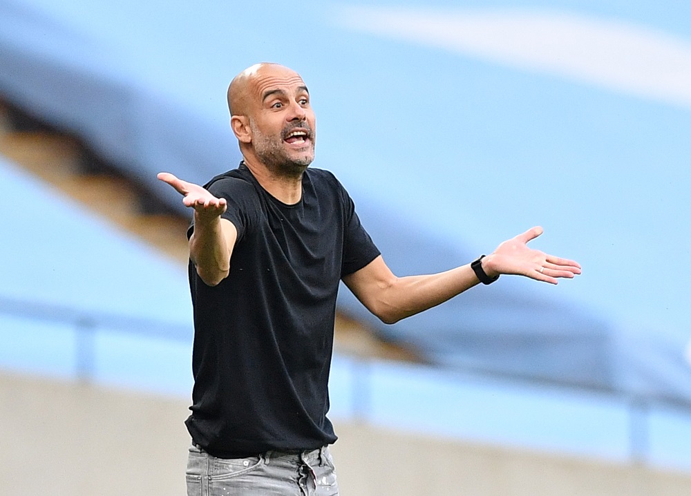 Manchester City manager Pep Guardiola reacts, as play resumes behind closed doors following the outbreak of the coronavirus disease, at the Wembley Stadium in London July 18, 2020. u00e2u20acu201d Picture by Justin Tallis/Pool via REUTERS