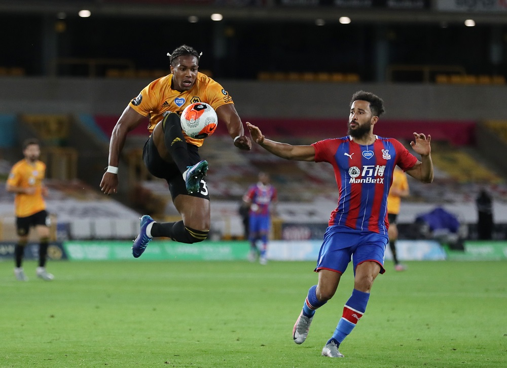 Wolverhampton Wanderers' Adama Traore in action with Crystal Palace's Andros Townsend, as play resumes behind closed doors following the outbreak of the coronavirus disease, at the Molineux Stadium in Wolverhampton July 20, 2020. u00e2u20acu201d Reuters pic