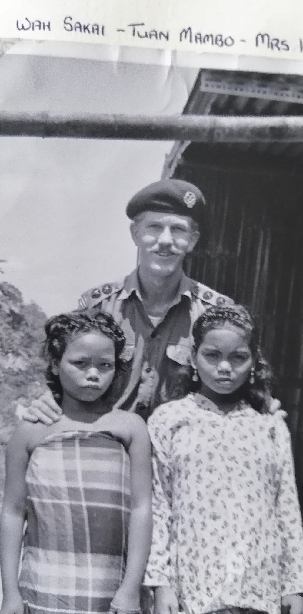 Lt. Peter Julius poses with two Orang Asli females, whom he named as Wah Sakai (left) and Mrs. Kun.  — Picture courtesy of Peter Julius   