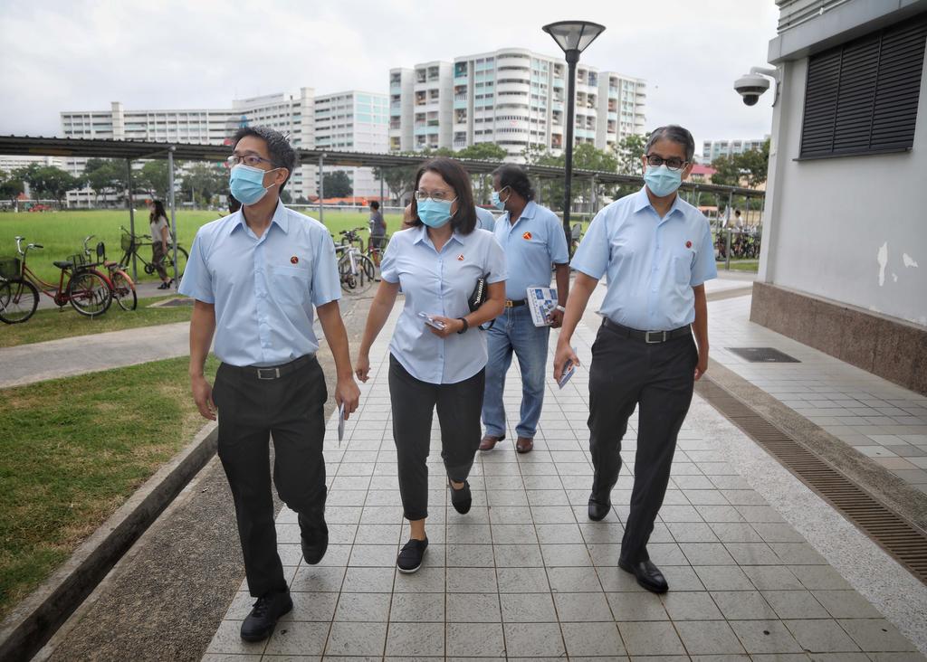 The Workersu00e2u20acu2122 Partyu00e2u20acu2122s (WP) team in the race to retain Aljunied Group Representation Constituency (GRC) pounded the pavements near Hougang Mall and Hougang MRT Station early this morning. u00e2u20acu201d TODAY picn