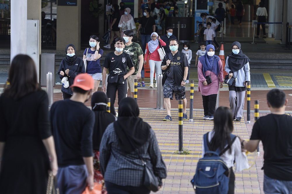 People wearing face masks July 11, 2020. u00e2u20acu201d Picture by Miera Zulyana