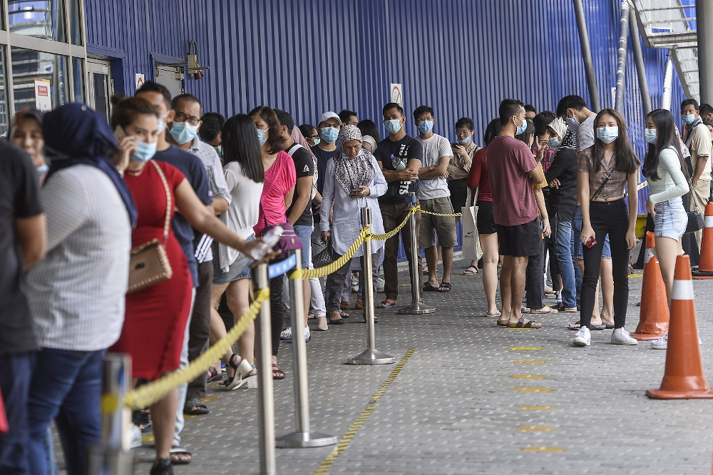 People wearing face masks July 11, 2020. u00e2u20acu201d Picture by Miera Zulyana